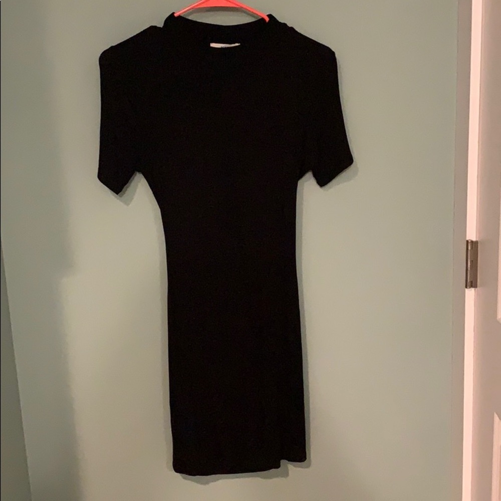 Tight black open back dress